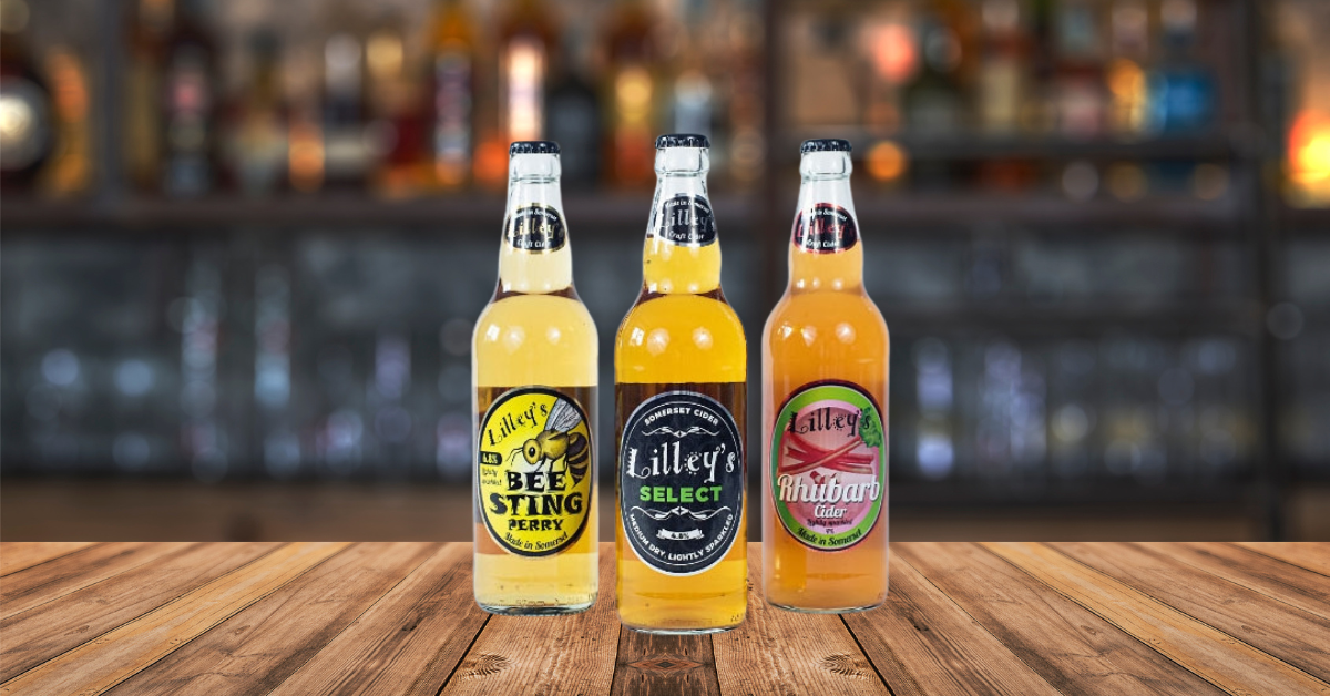 Wide angle shot of a bar background with Lilley's Cider drinks presented in the foreground.